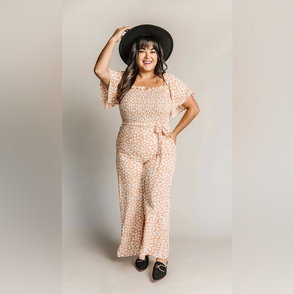 Flowy Orange and White Smocked Floral Jumpsuit with Toe Waist